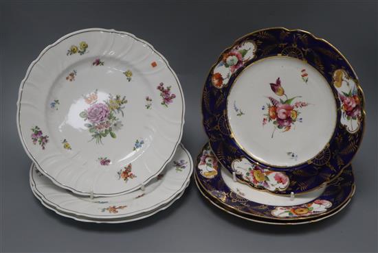 Three mid 19th century floral painted porcelain dessert plates, in the manner of Derby and a set of three French porcelain plates